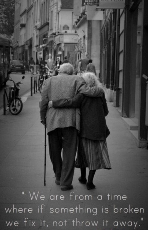 Old couple embrace